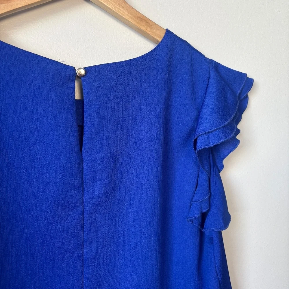 Blue short sleeve ruffle blouse Milk + Honey size L - Picture 4 of 10